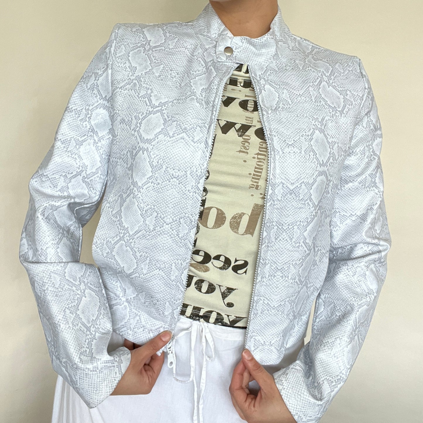 Veste simili cuir effet python blanche