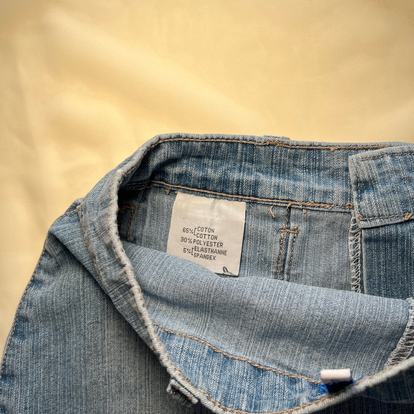 Mini jupe plissée en denim clair