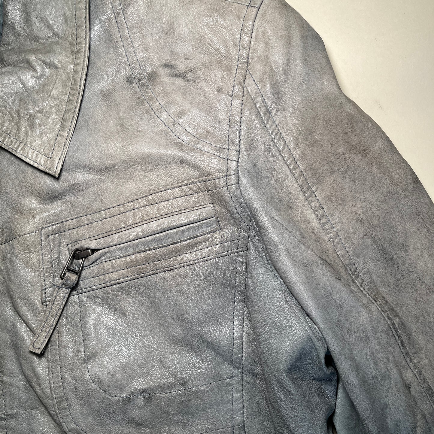 Veste zippée en cuir bleu/gris