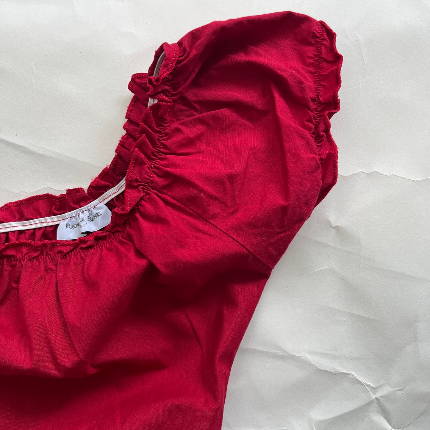 Robe rouge col bardot